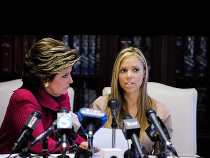 Vanessa Lopez, ex-mistress of Shaquille O'Neal, speaks as her attorney Gloria Allred listens.