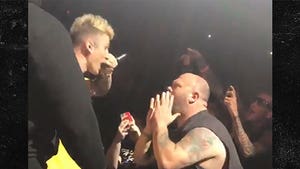 Machine Gun Kelly Confronted By Fan During Concert But it Looks Staged