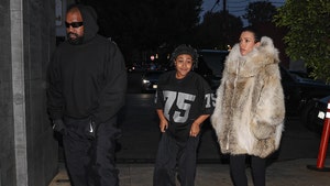Bianca Censori Covers Up in Fur for Dinner with Kanye and North West