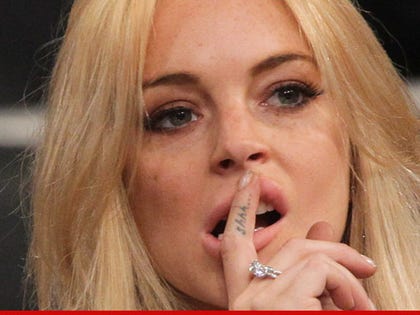 0611_llindsay_lohan_lying_article_2