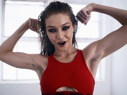 1211-gigi-hadid-armpit-stubble-hair-youtube-02