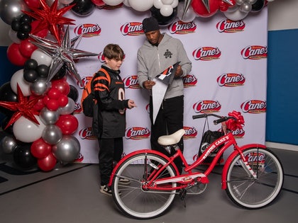 Tee Higgins bike giveaway Raising Canes Photos 0003