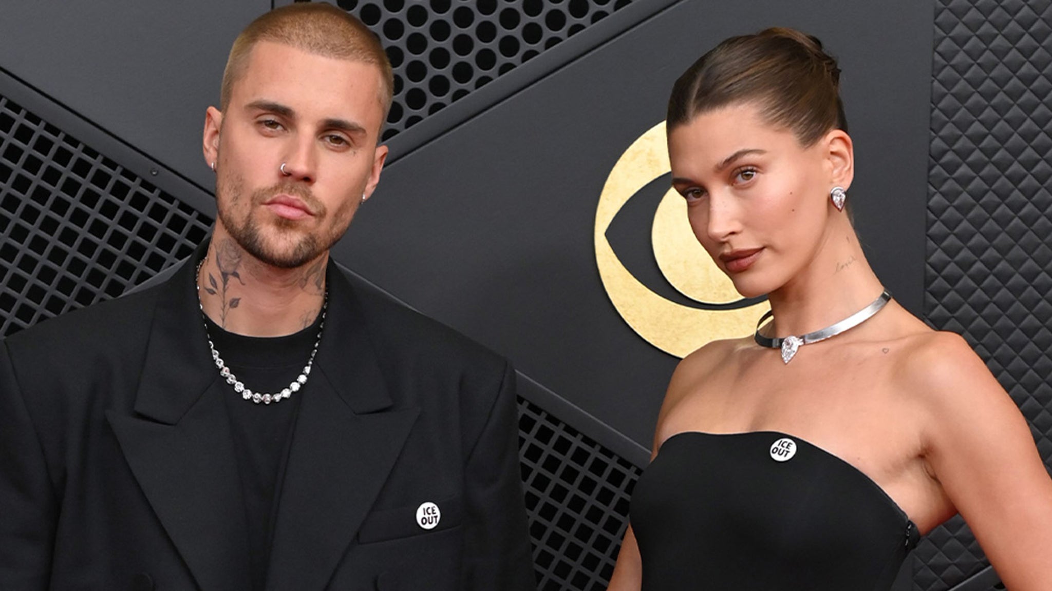 Justin and Hailey Bieber Wear ‘ICE Out’ Pins to Grammys