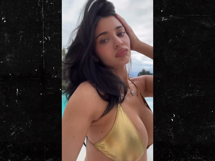 Kylie Jenner Rings in New Year Busting Out of Gold Bikini 1 010226 kylie jenner sub1