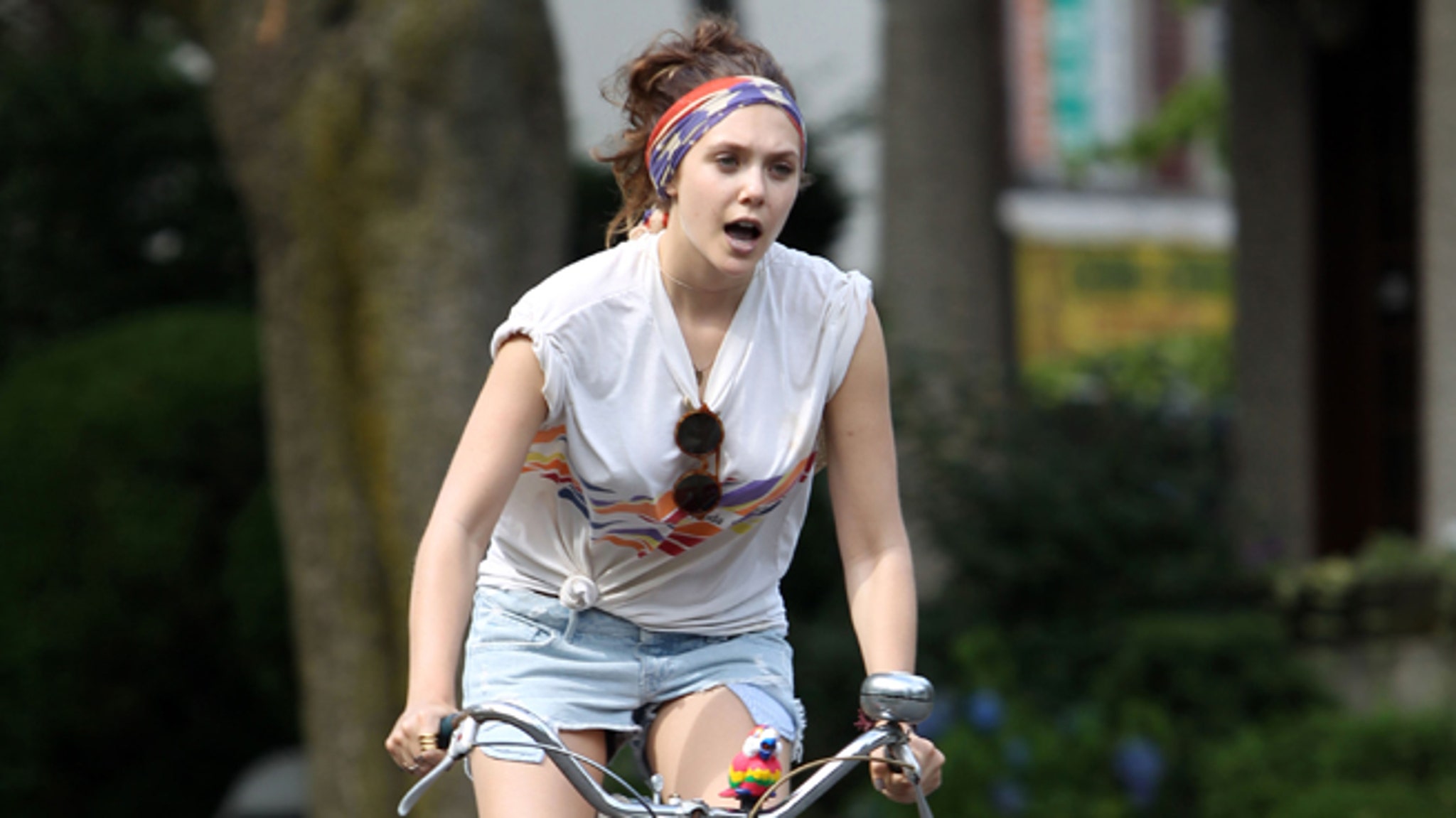 Elizabeth Olsen and Dakota Fanning -- Pedal Power!