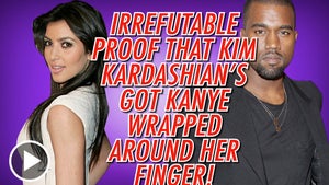 Kim Kardashian Has a GIANT ... Handful of Kanye West's Butt