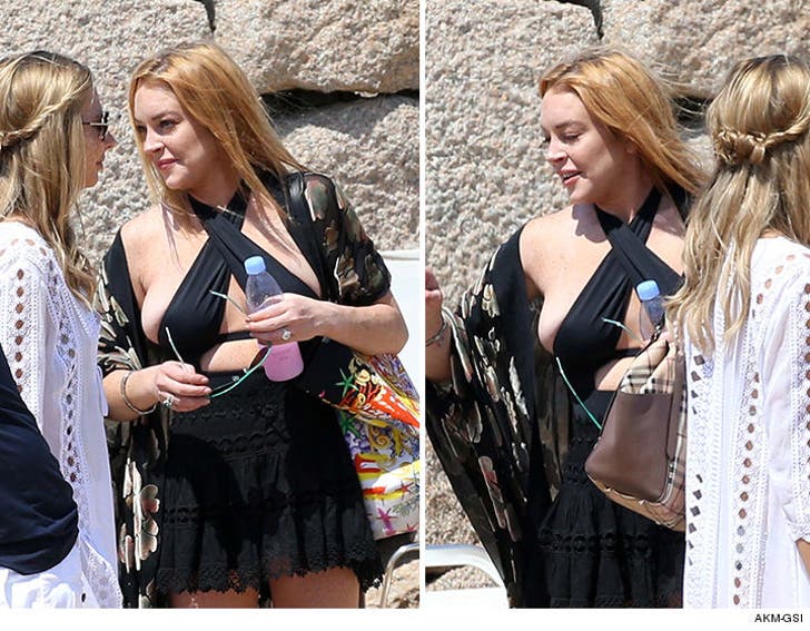 Lindsay Lohan: Boobs Ahoy! Major Spill on Yacht Trip (PHOTOS)