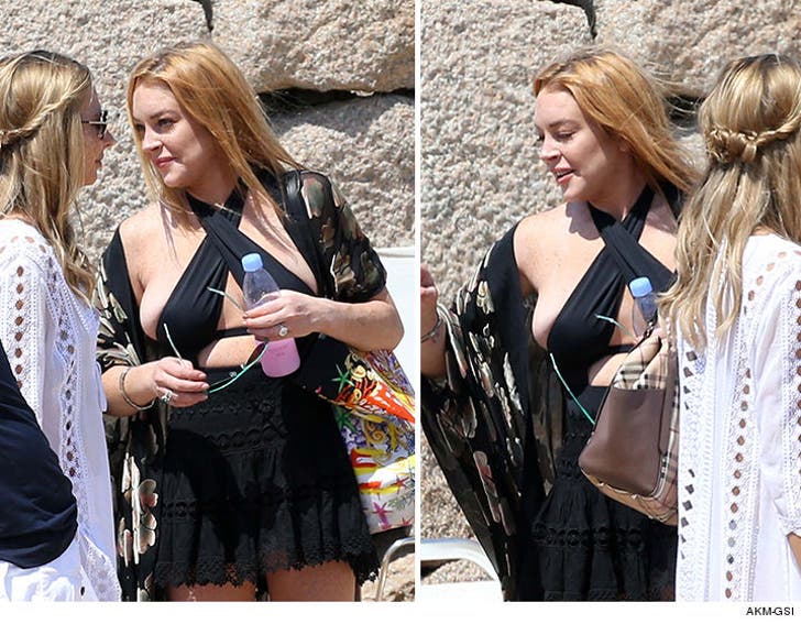 Lindsay Lohan -- Boobs Ahoy Major Spill on Yacht Trip :: 0731-lindsay-lohan-swimsuit-malfunction-akmgsi-4