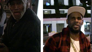 R. Kelly Gets Shade from Homeless Man After $100 Handout
