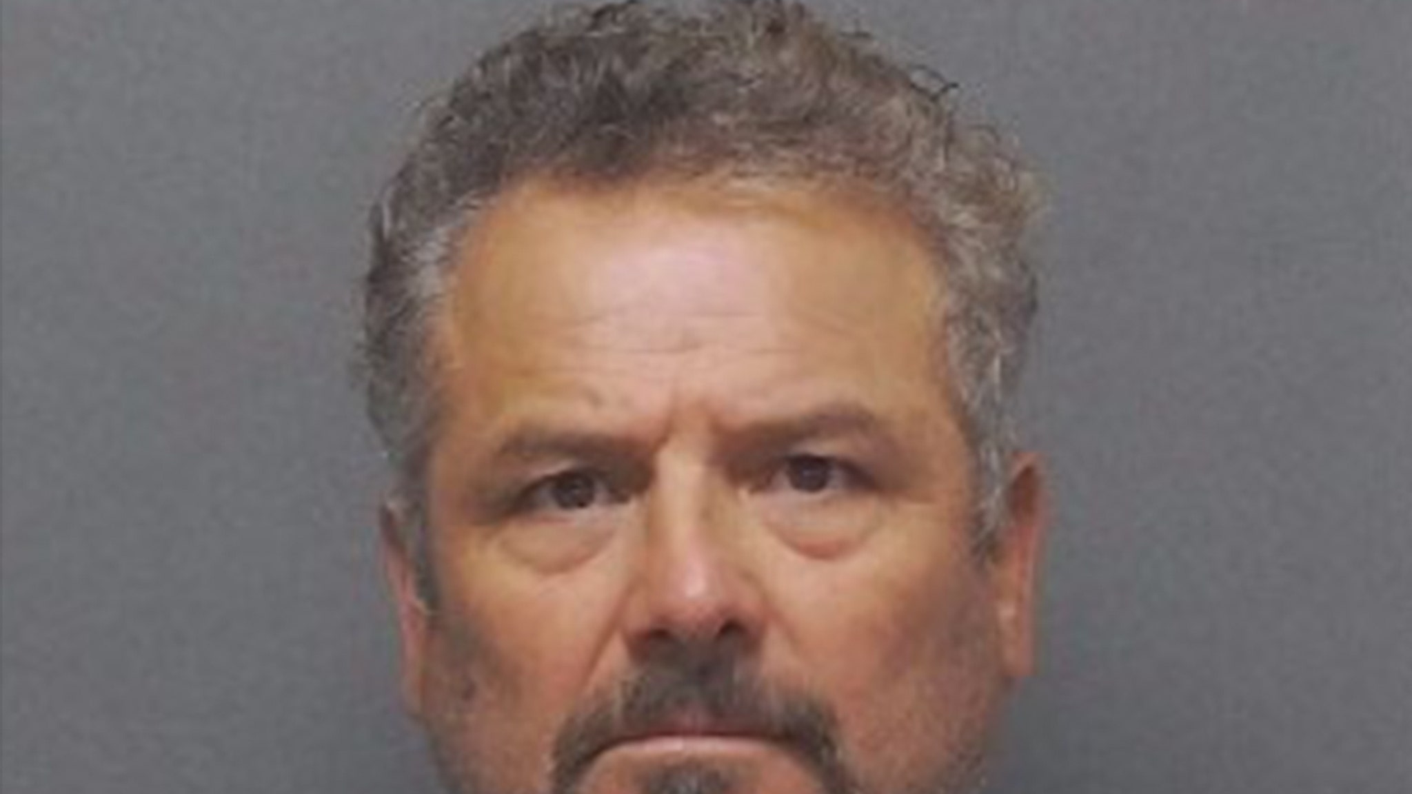 Suspect's Mug Shot in Murder of 'King of the Hill' Voice Actor Released