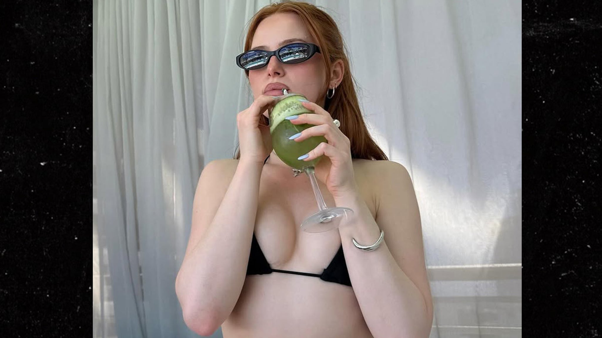 Riverdales Madelaine Petsch Puts Cleavage On Full Display In Black Bikini