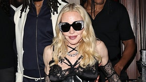 gallery-launch-madonna-splashnews-1