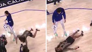 NBA Reporter Kristina Pink Lands Face-First On Court After Slipping On Water