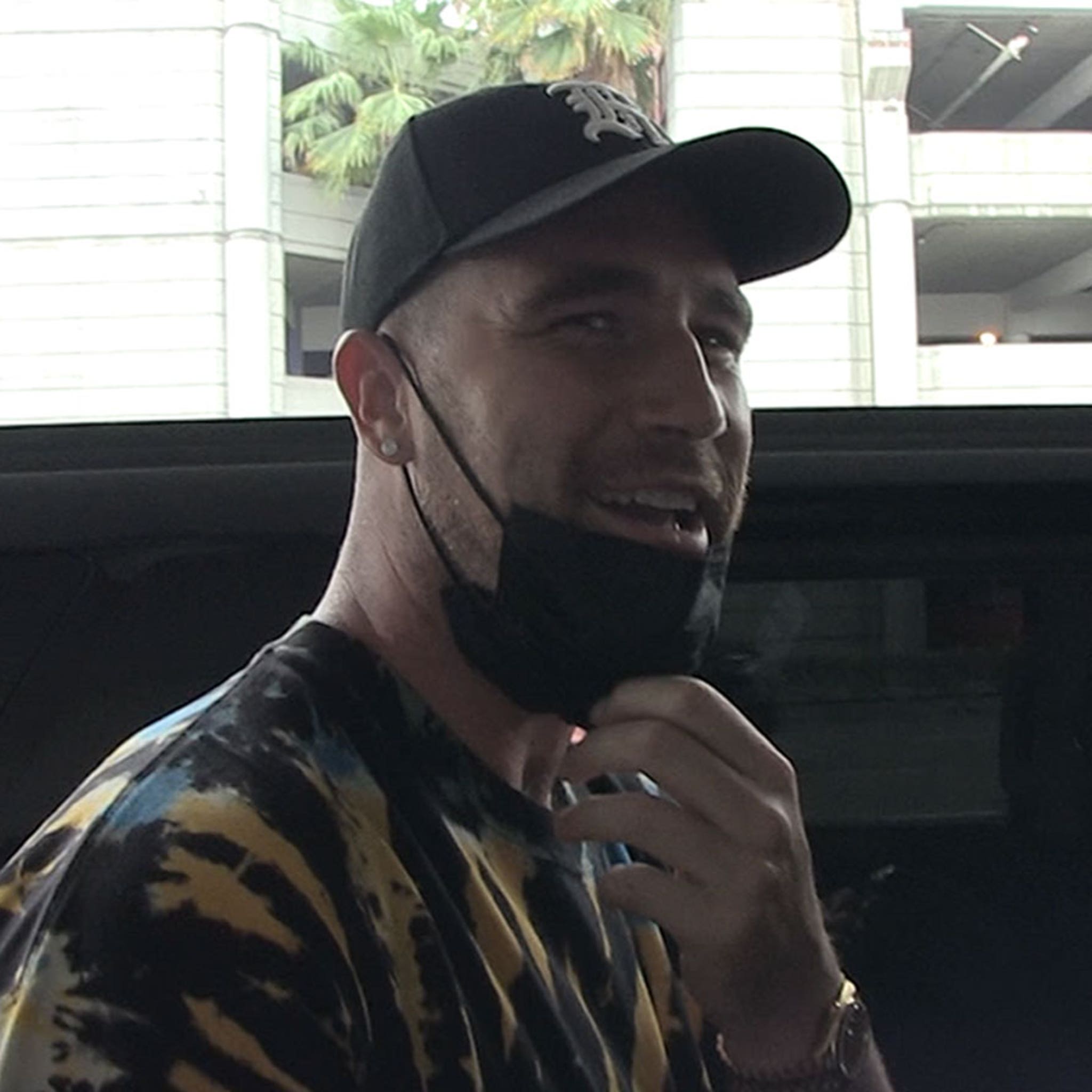 Travis Kelce Says He Might Rock Baby 