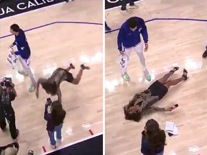 NBA Reporter Kristina Pink Lands Face-First On Court After Slipping On Water.jpg